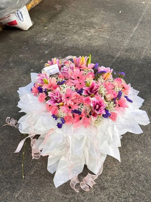 Giant mixed flower bouquet with roses, lilies, gerbera and carnations