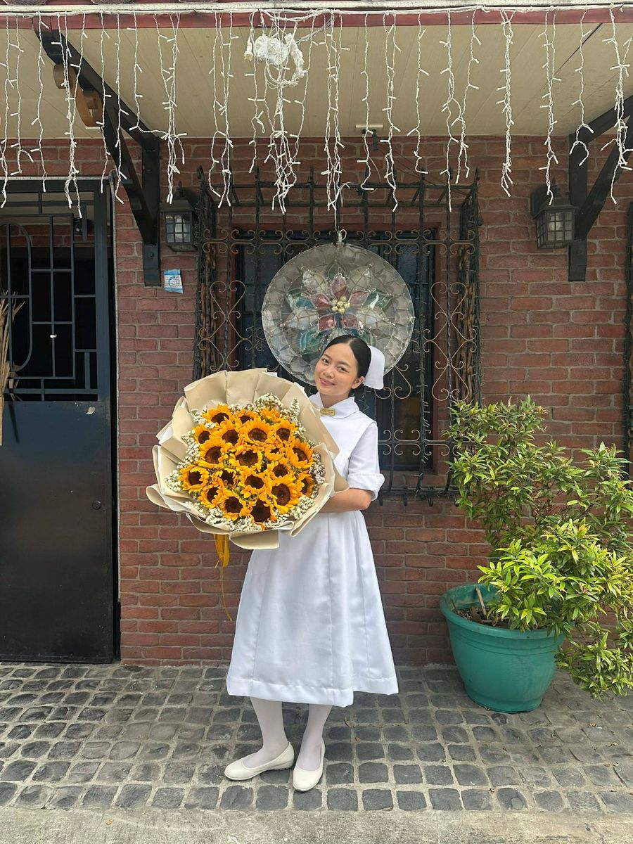 Large sunflower bouquet with soft filler flowers