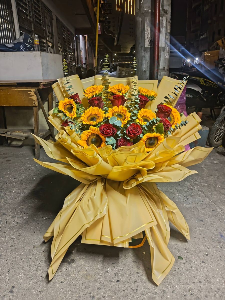 Sunflower and red rose statement bouquet with eucalyptus