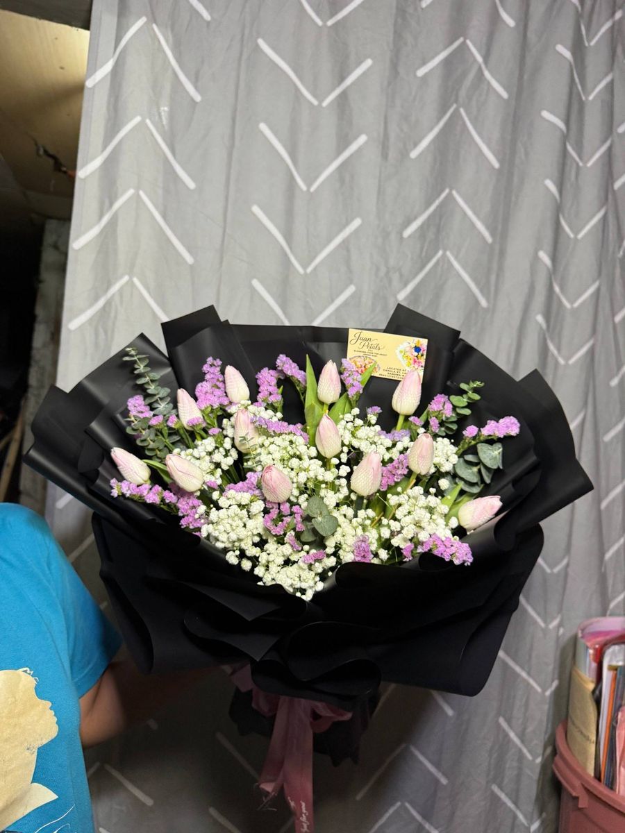 Pink and purple tulip bouquet with delicate filler flowers