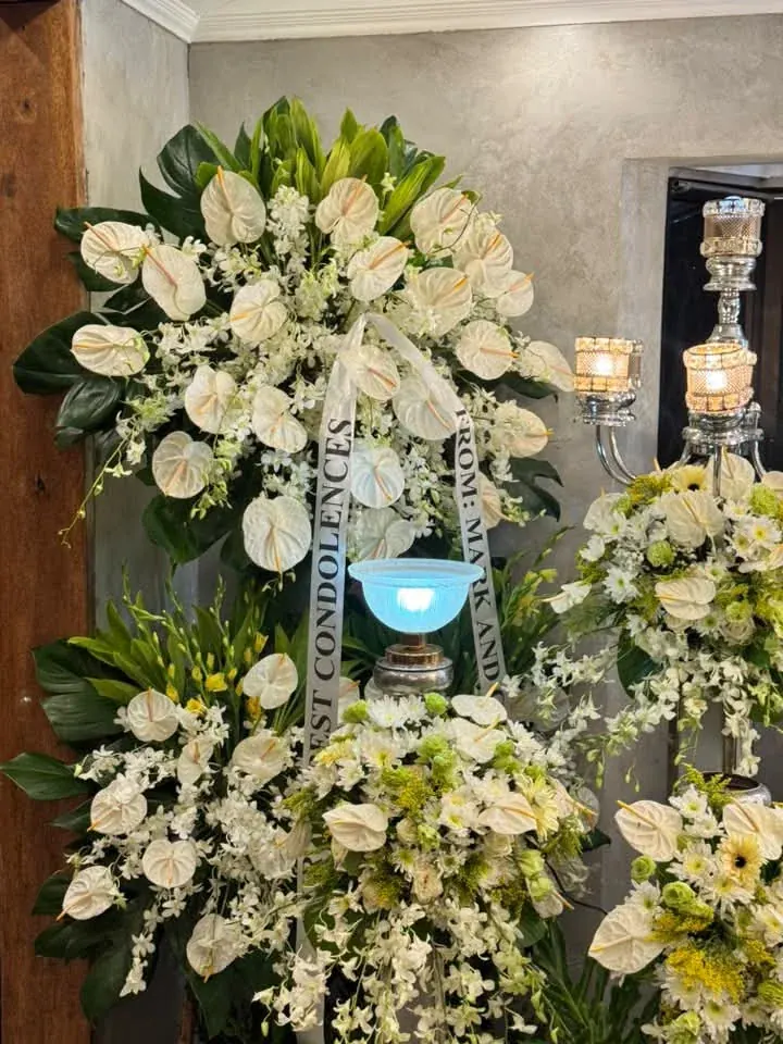 White sympathy flower arrangement by Juan Petals PH