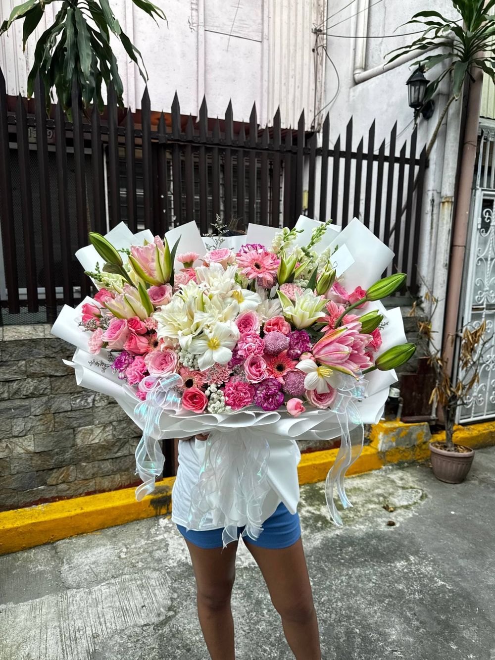 Red rose and pink lily bouquet