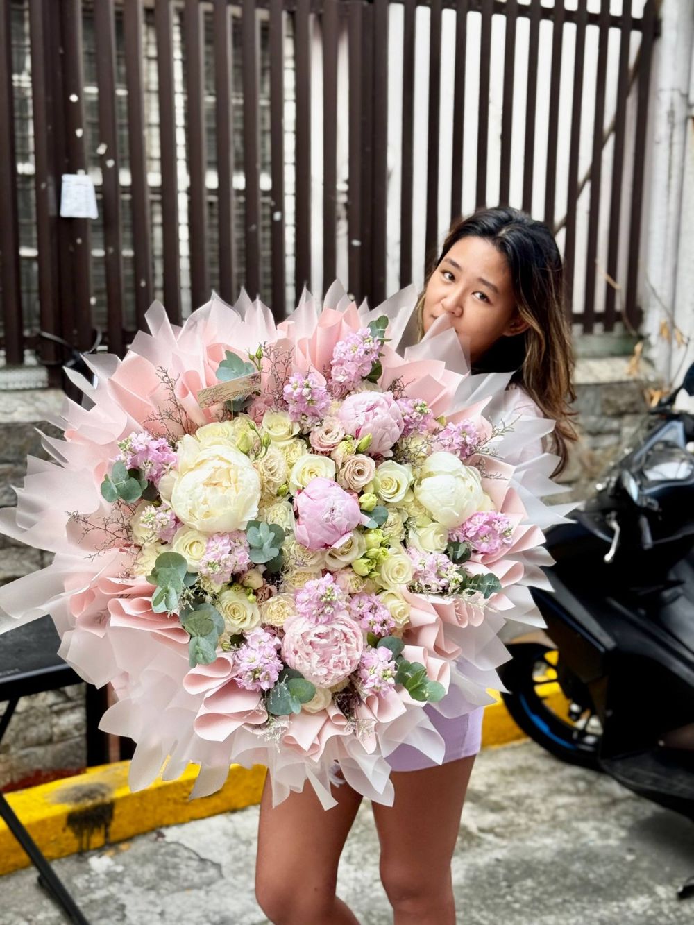 Peach rose and pink lily bouquet
